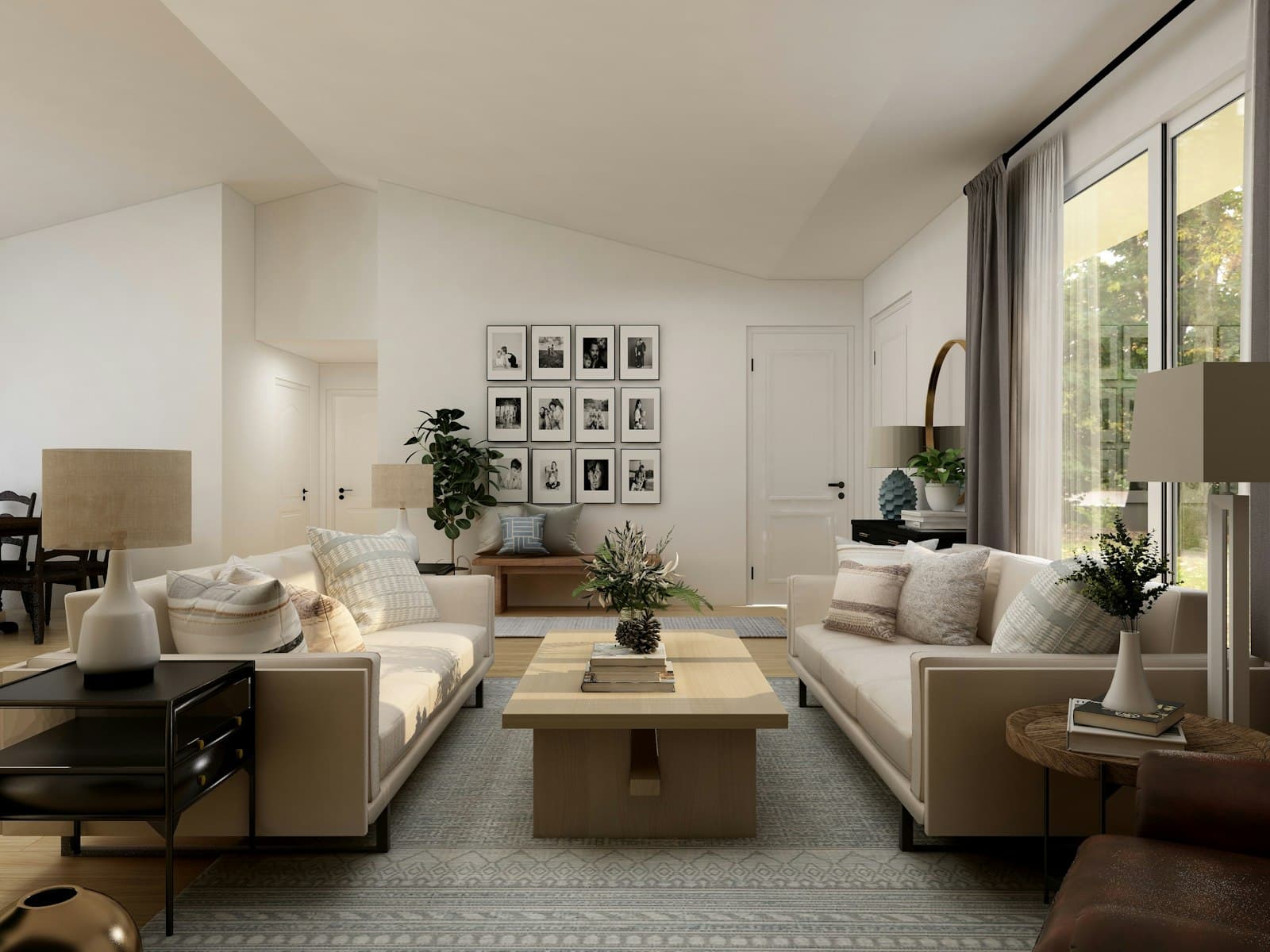 A living room with a white sofa and a potted plant