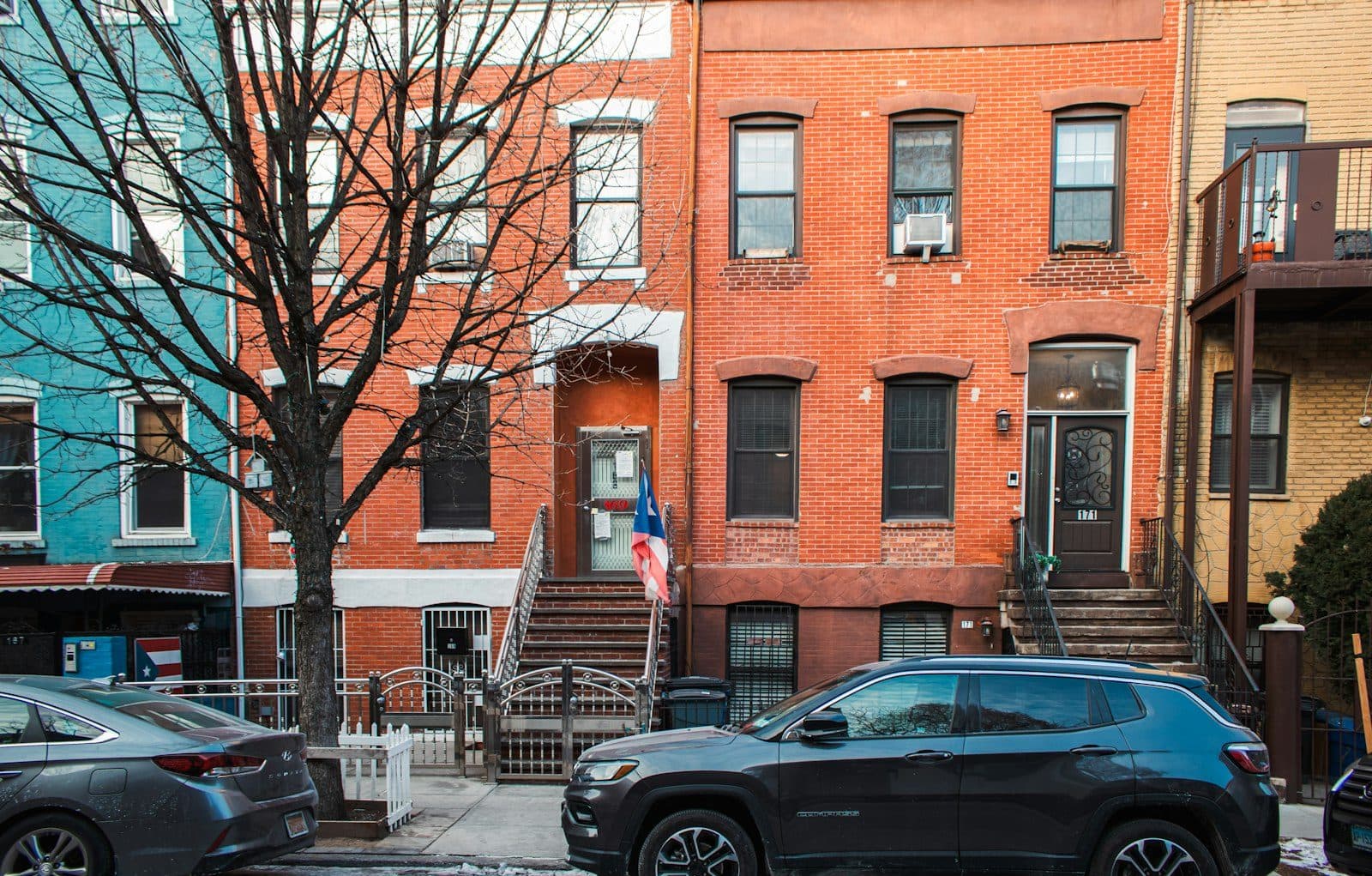 Row houses lining a quiet residential street